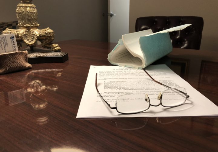 New and old legal documents on a desk