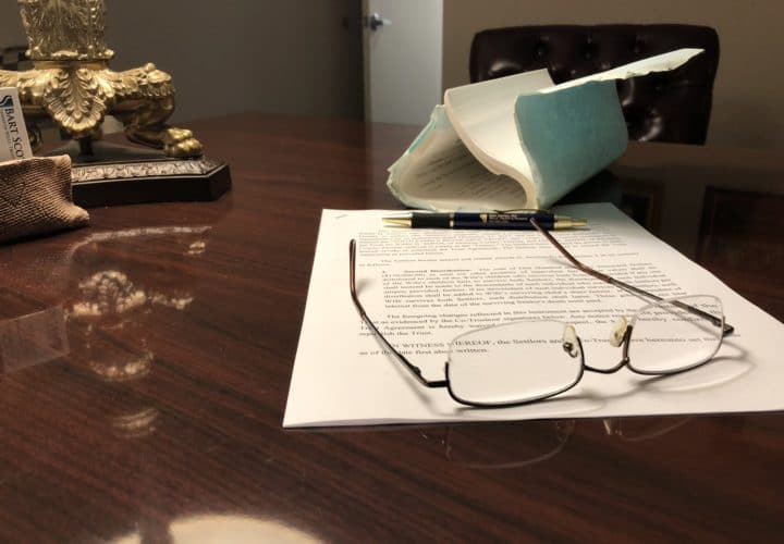 New and old legal documents on a desk