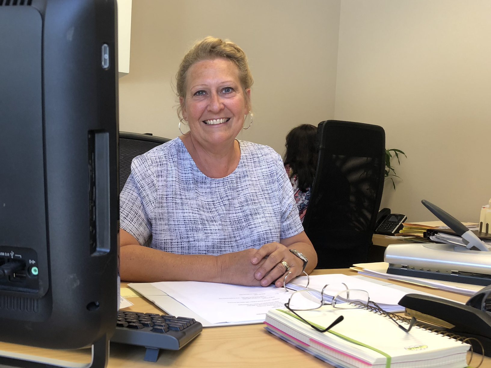 Cindy at her desk